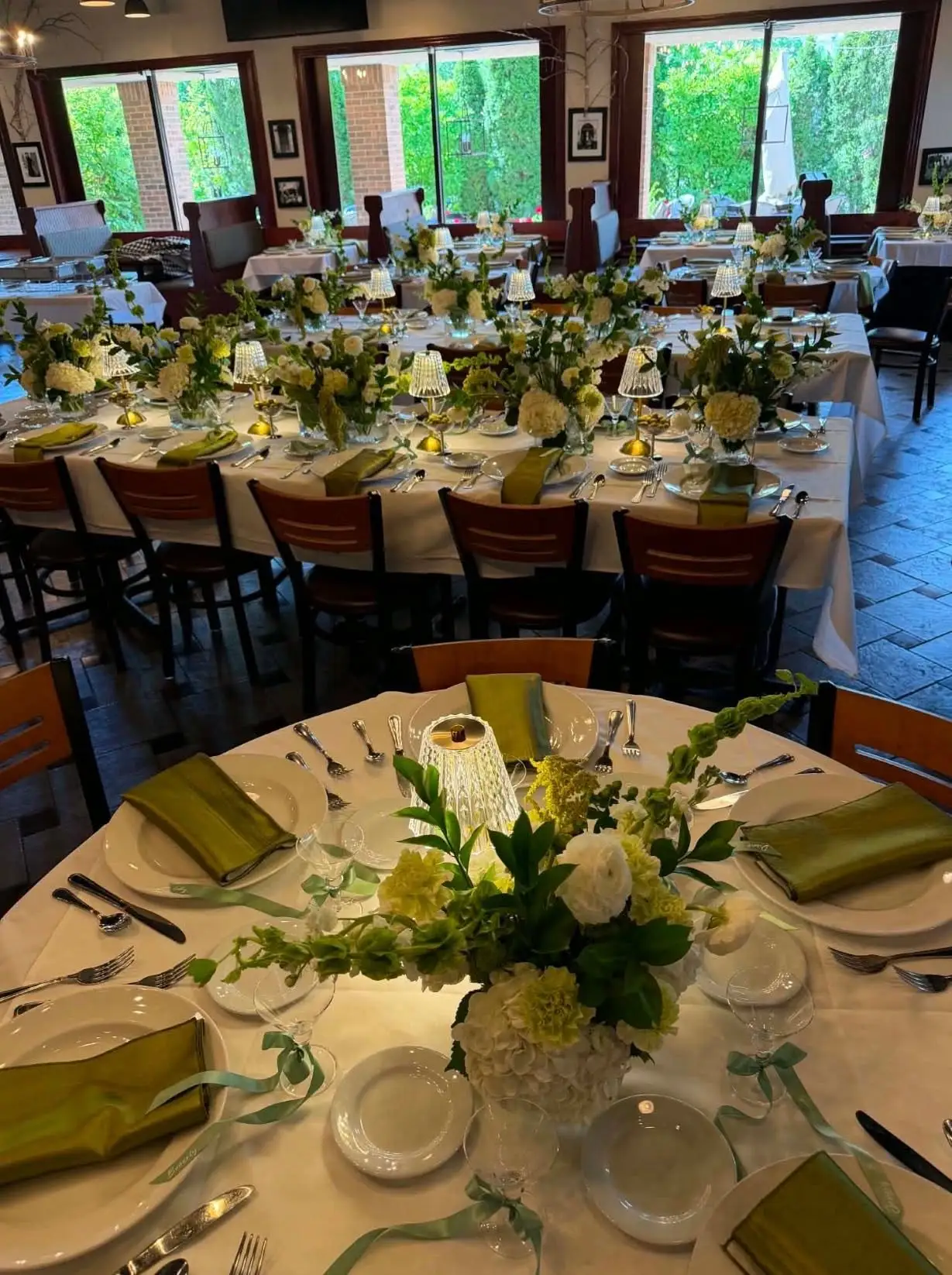 Bridal shower tablescape with martini-themed decor and florals