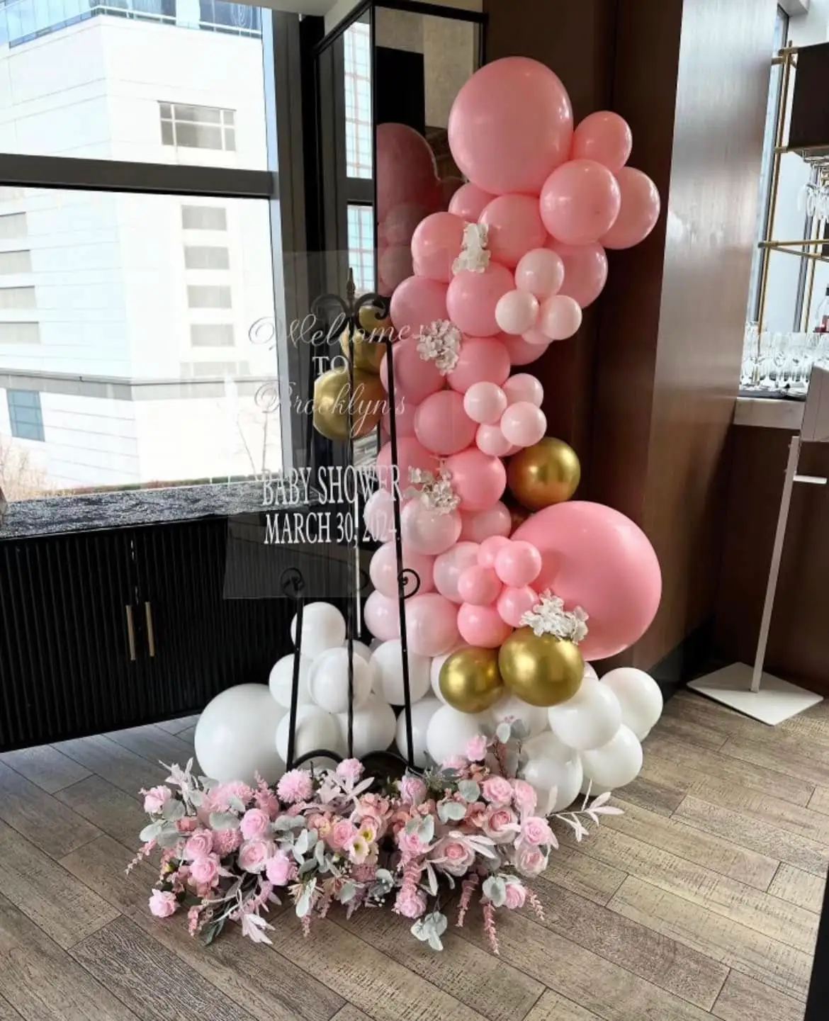 Royal baby shower decor in Chicago with balloon styling and a polished backdrop