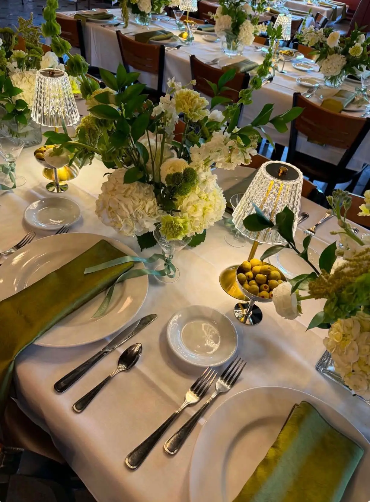 Martini-themed bridal shower decor in Chicago with soft balloons, florals and a styled backdrop