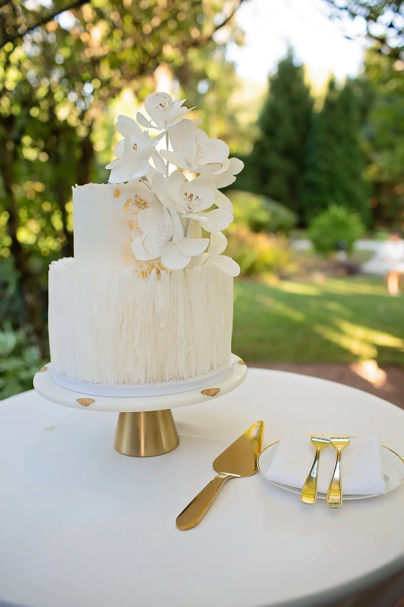 Wedding venue decor details with soft florals and elegant table styling